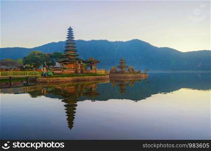 Ulun Danu Bratan Temple and lake in Bali. It is one of the most popular of tourist attraction. Indonesia. Hindu pagoda architecture of travel trip and holidays vacation in Indonesia.