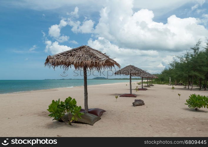 umbrella and beautiful beach on a sunny day