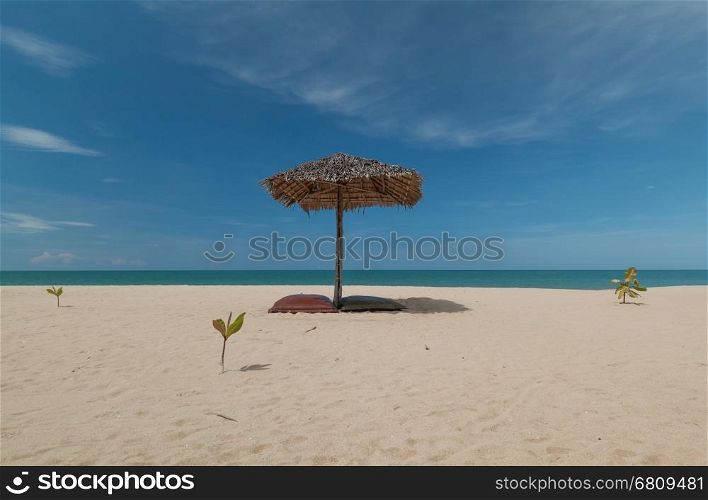 umbrella and beautiful beach on a sunny day