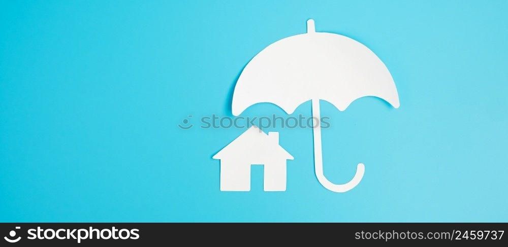 Umbrella cover Home paper on blue background. Warranty, Maintenance, real estate and insurance concept