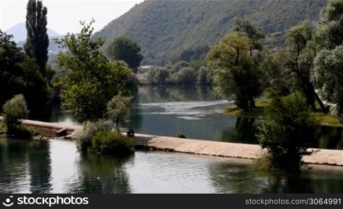 Una river, Bihac, Bosnia and Herzegovina, shot from bridge in center