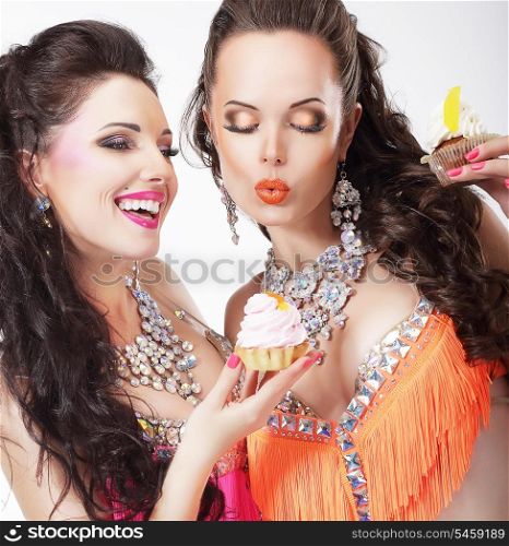 Unbalanced Diet Concept. Women Gourmets with Delicious Cupcakes. Series of Photos
