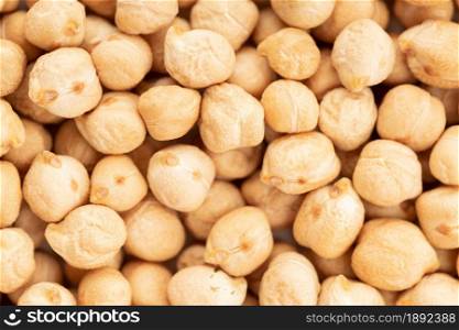 Uncooked chickpea background texture. Full frame Cicer arietinum
