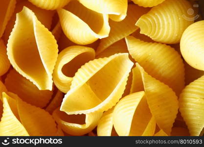 Uncooked italian pasta, may be used as background