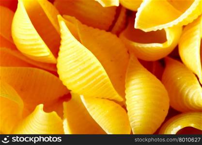Uncooked italian pasta, may be used as background