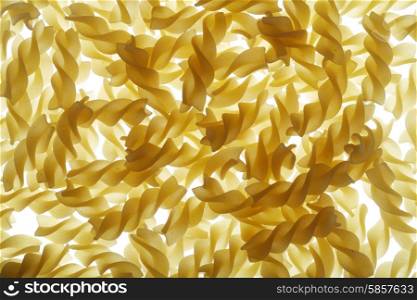Uncooked pasta fusilli aka. twisted spaghetti.