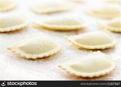 Uncooked ravioli pasta prepared and ready for cooking