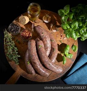 Uncooked Raw Beef And Pork Sausage Sausages and spices