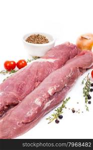 uncooked raw meat fillet with serving spices on white background