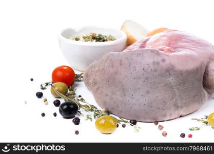 uncooked raw tongue with serving spices on white background