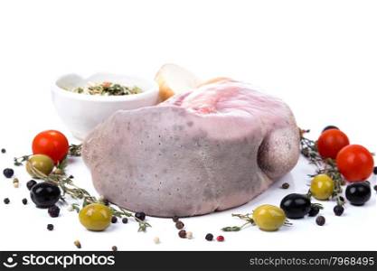 uncooked raw tongue with serving spices on white background