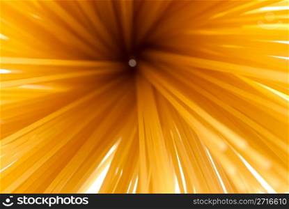 Uncooked spaghetti detail isolated on white background.