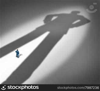 Under a shadow business metaphor for living under a powerful leader or the little guy or small business competing against giants as a businessman facing a huge darkness shaped as a giant man as a symbol of a bodyguard or guardian angel.