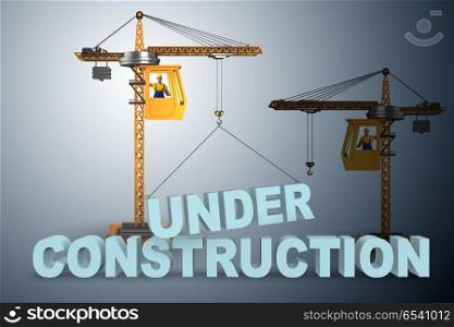 Under construction letters lifted by crane