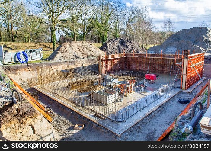 Underground construction site of house with concrete