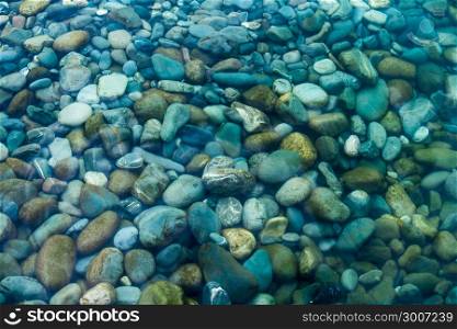 Underwater sea stones. sea water and pebbles