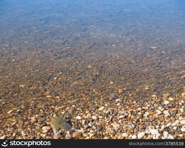 Underwater view. Under water view of gravel and stones below water level in a river