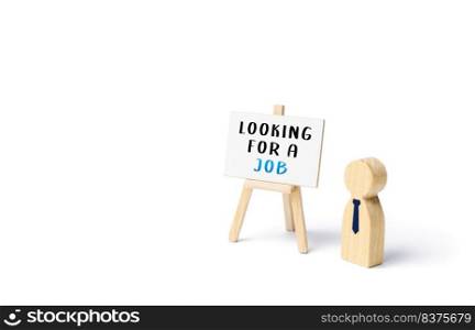 Unemployed employee figurine looking for a job. Finding a better job. Change of workplace. Search and recruitment of new employees for work. Hire staff. Employment Agency. Recruiting, staffing.
