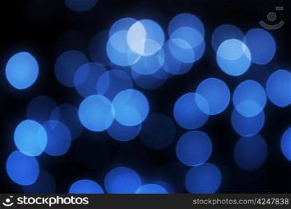 Unfocused blue lights holiday background