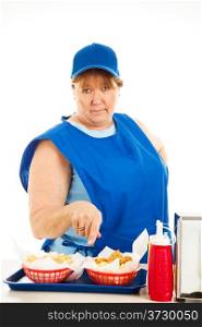 Unfriendly, no-nonsense cashier at a fast food restaurant, serving your order. Isolated on white.