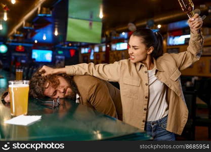Unhappy and angry fans fighting at sport bar. Crazy mad woman trying break beer bottle on male head. Problematic football fans. People emotion and bad behavior. Unhappy and angry fans fighting at sport bar