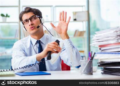 Unhappy angry call center worker frustrated with workload