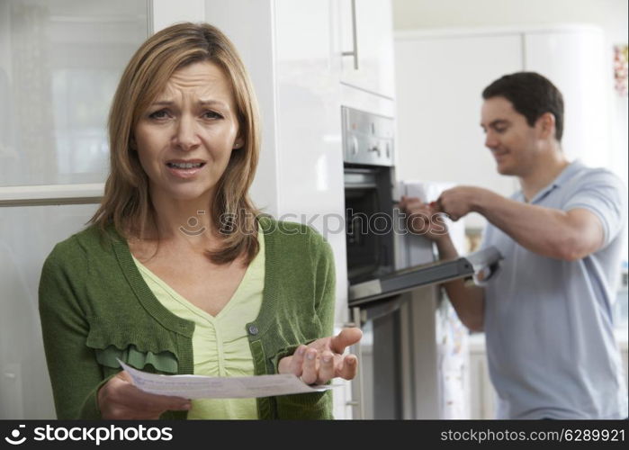 Unhappy Female Customer With Oven Repair Bill