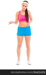 Unhappy girl in sportswear checking body fat isolated on white&#xA;