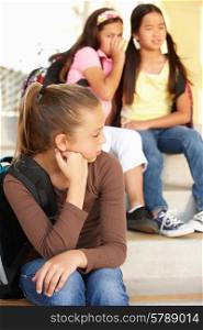 Unhappy Pre teen girl in school