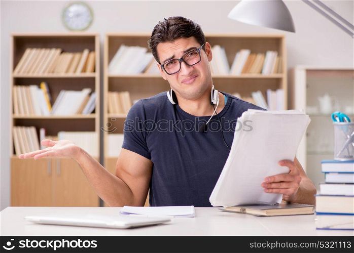 Unhappy student with too much to study