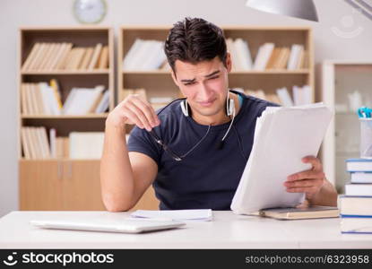 Unhappy student with too much to study