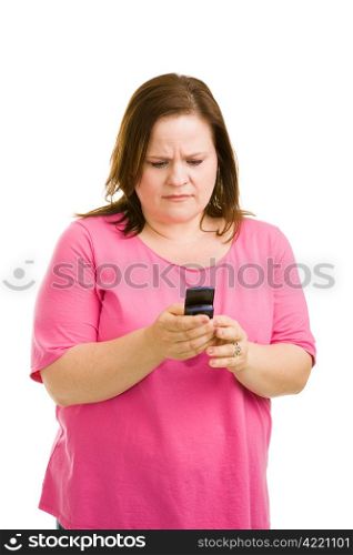 Unhappy woman getting bad news via text message. Isolated on white.