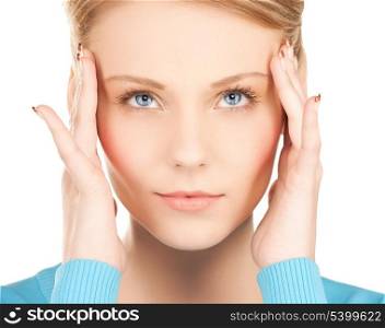 unhappy woman holding her head with hands