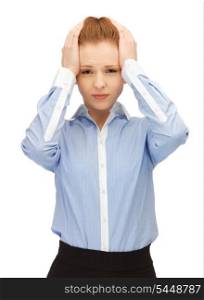 unhappy woman holding her head with hands.