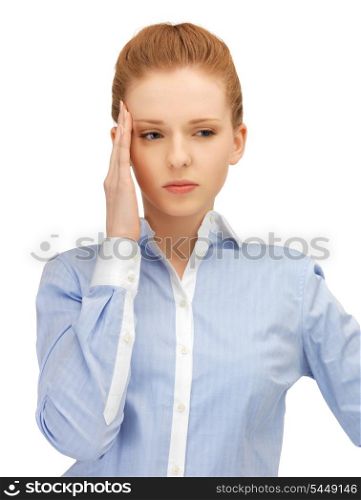 unhappy woman holding her head with hands.