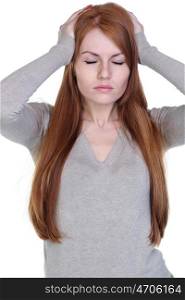 Unhappy young woman with bad headache on white background