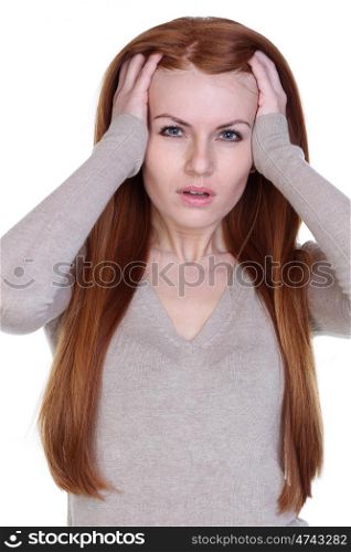 Unhappy young woman with bad headache on white background