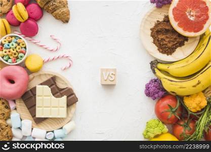 unhealthy versus healthy foods white surface
