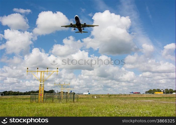 unidentified plane on landing approach at amsterdam airport