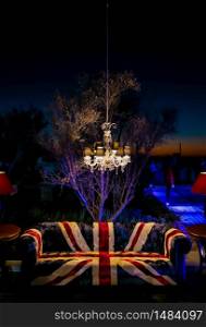 Union Jack British Flag couch and chandelier at outdoor corporate event gala dinner banquet