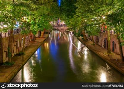 Unique embankments with two levels along the Oudegracht at night, Utrecht, Netherlands
