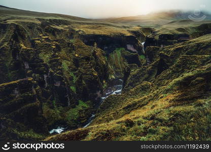 Unique landscape of Fjadrargljufur in Iceland. Top tourism destination. Fjadrargljufur Canyon is a massive canyon about 100 meters deep and about 2 kilometers long, located in South East of Iceland.