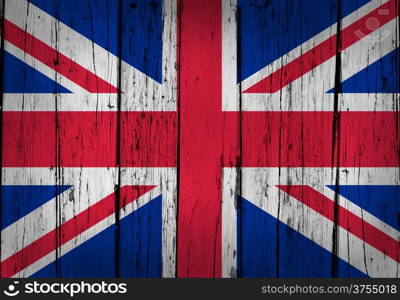 United Kingdom grunge wood background with British flag painted on aged wooden wall.