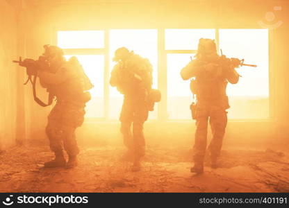 United States Army rangers during the military operation in the smoke and fire