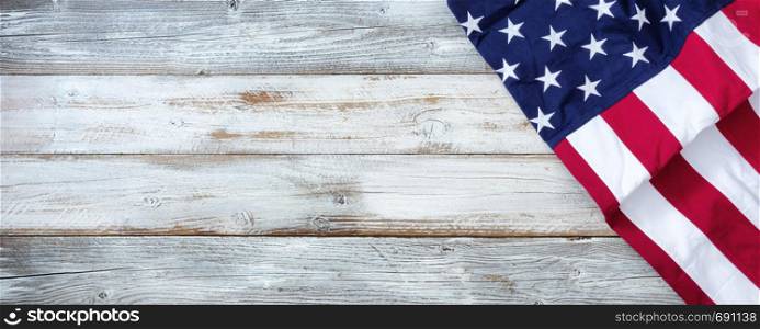 United States flag on white rustic wooden background with plenty of copy space