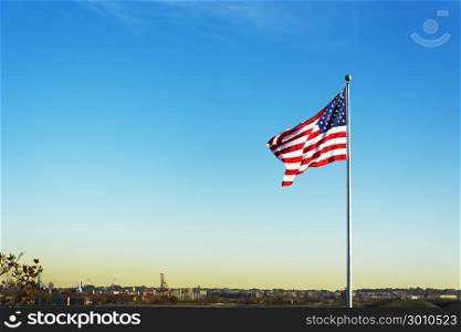 United States of America national Flag waving. Patriotic concept. Outdoor shot