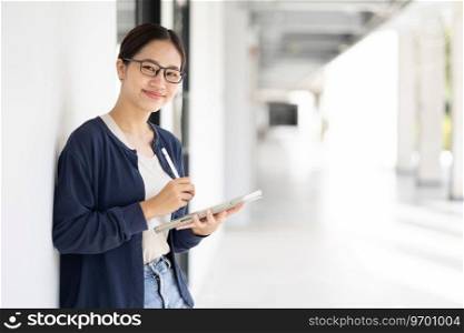 University Asian teen girl using tablet online learning modern education lifestyle in school c&us.