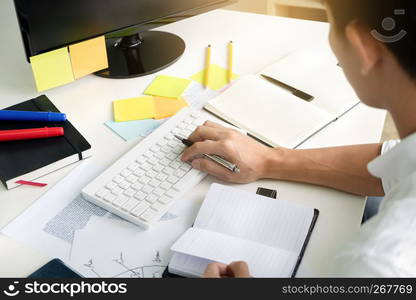 university / college student doing homework in classroom, education concept.