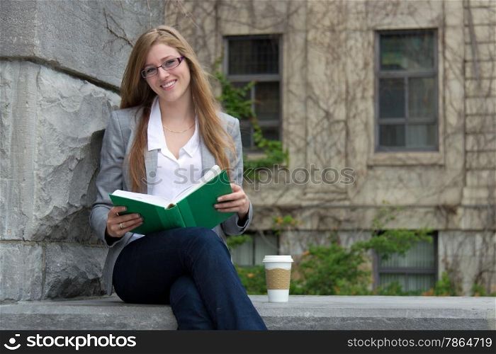 University student studying outside on campus