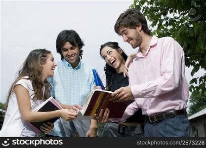 University students discussing and smiling